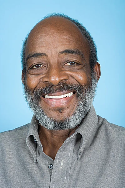 man showing his smile makeover from Optima Dental in Lawrenceville, GA
